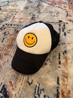 Black & White Trucker Hat with Yellow Smiley Patch